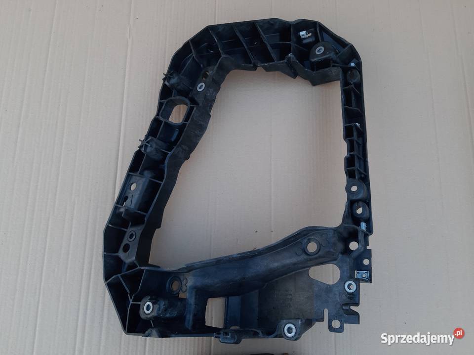 VOLVO FMX FM5 OKULAR RAMKA HALOGEN PRAWY Zderzaki Trzciel