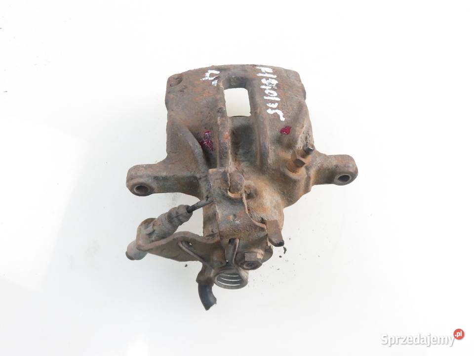 ZACISK LEWY TYŁ RENAULT TRAFIC II 19 dCi osobowe