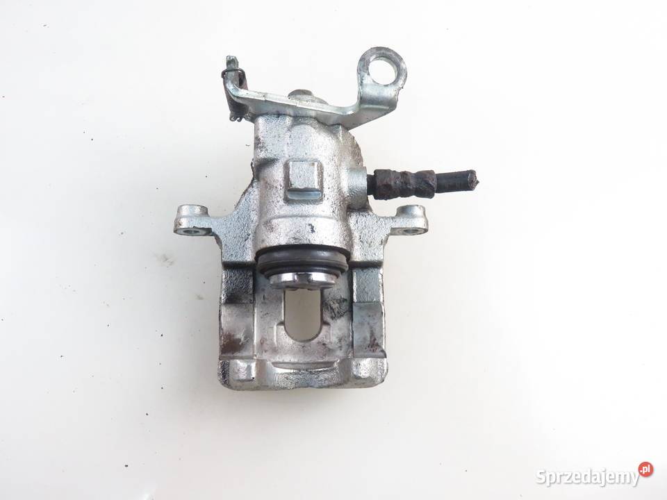 ZACISK LEWY TYŁ FORD FOCUS MK1 Turnier 18 16V