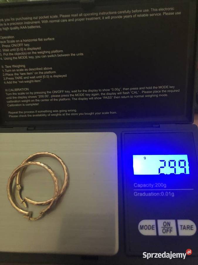 Złote kolczyki kółka koła