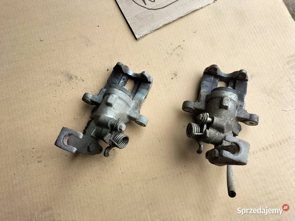 NISSAN PRIMERA P11 ZACISK HAMULCOWY TYŁ TYLNY