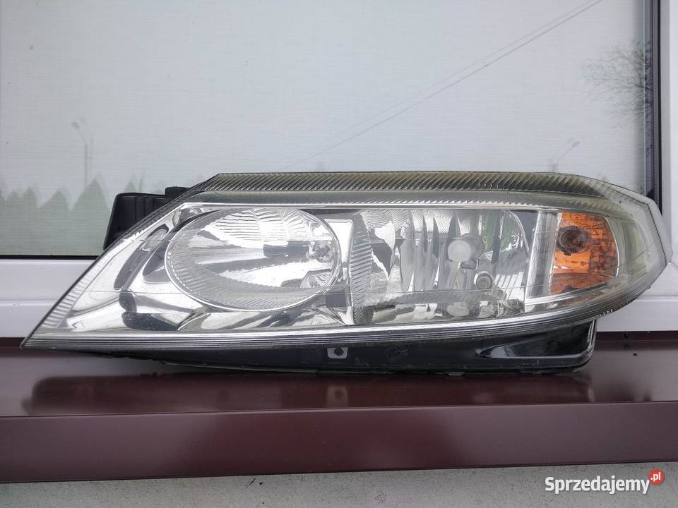 Renault Laguna 2 II lampa przednia lewa Sieradz