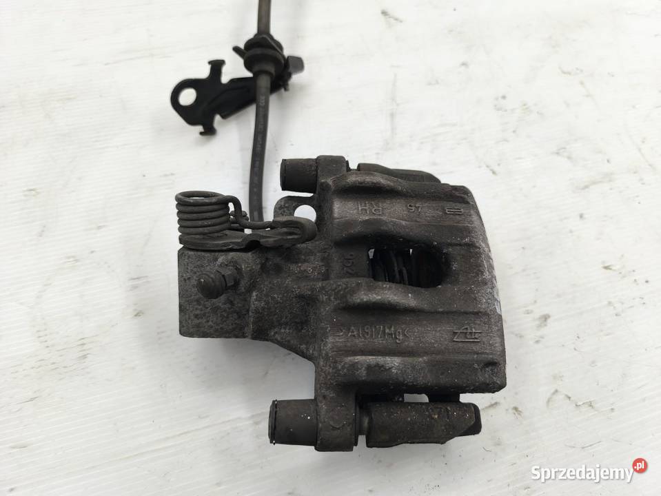ZACISK PRAWY TYŁ FORD FOCUS MK3 LIFT KOMBI