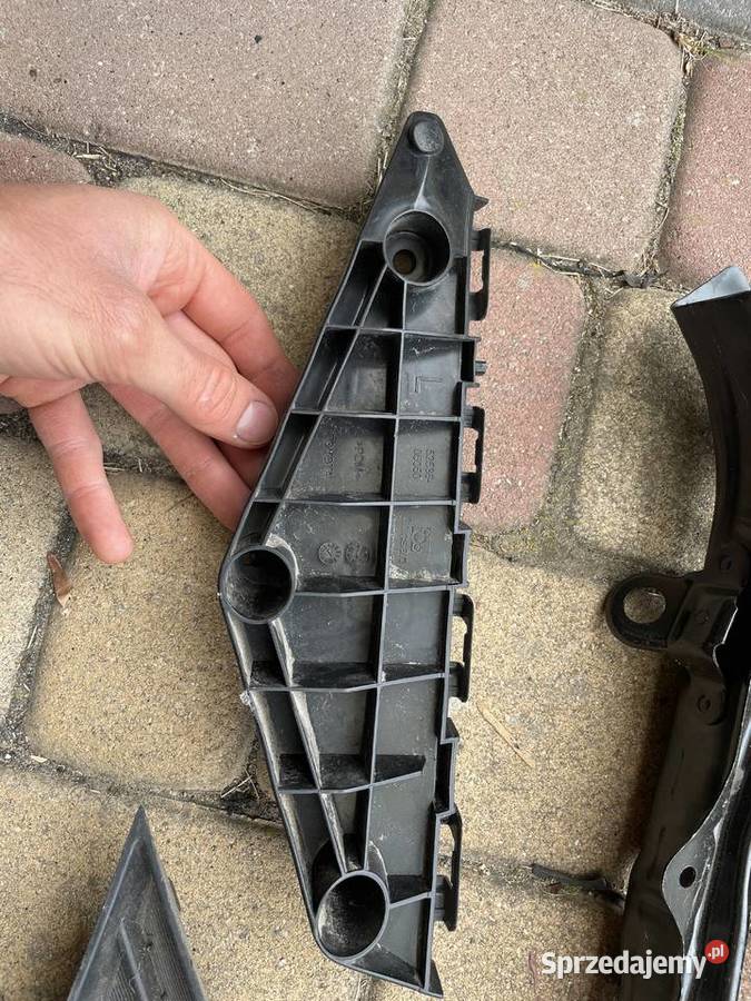 Ślizg mocowanie zderzaka lewy przód oryginał Elbląg