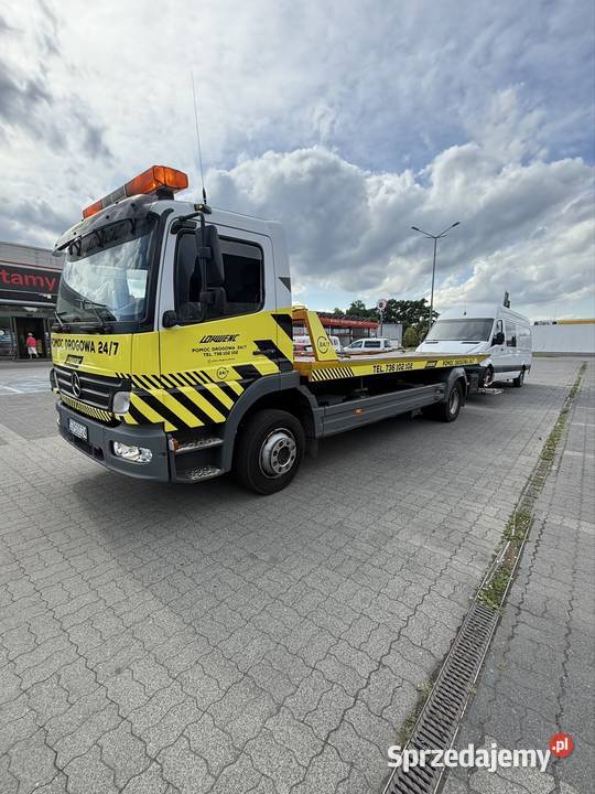 Pomoc drogowa holowanie laweta 247 transport Żory usługi moto