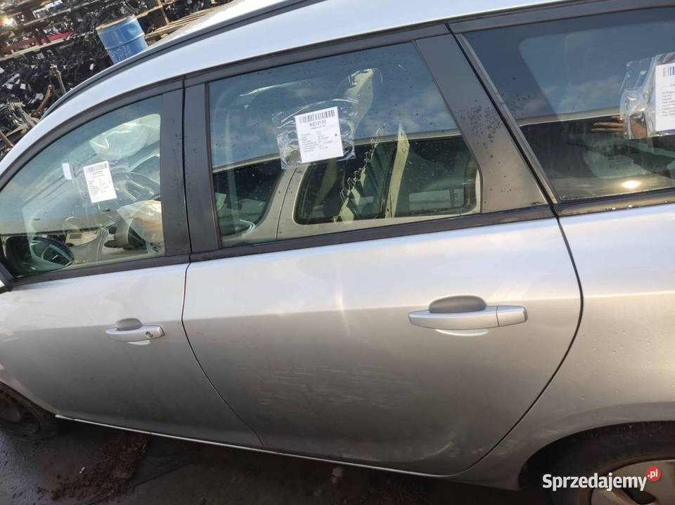 DRZWI LEWE TYŁ OPEL ASTRA J Z176 osobowe kujawsko-pomorskie Lipno