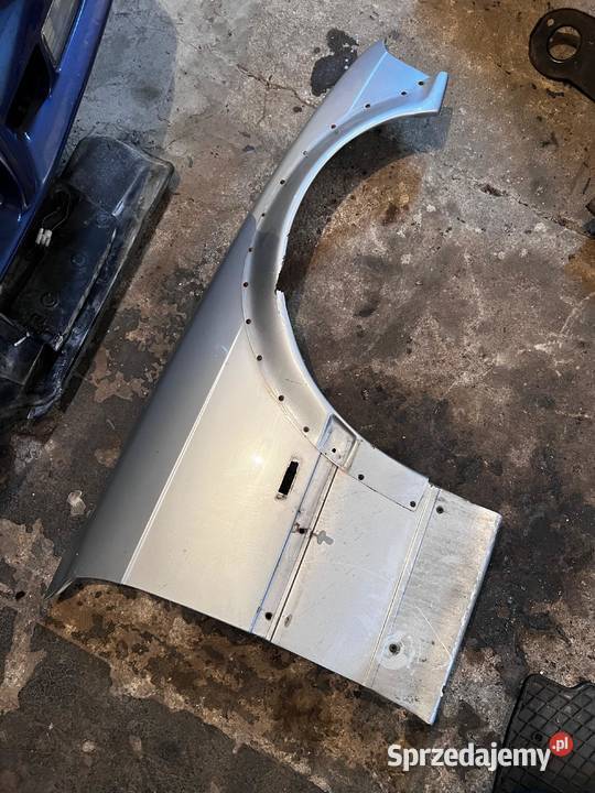 Poszerzone oryginalne błotniki przód BMW E36 Piasek sprzedam