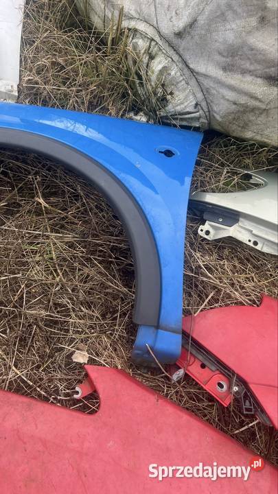 Blotnik lewy opel corsa c niebieski Margonin