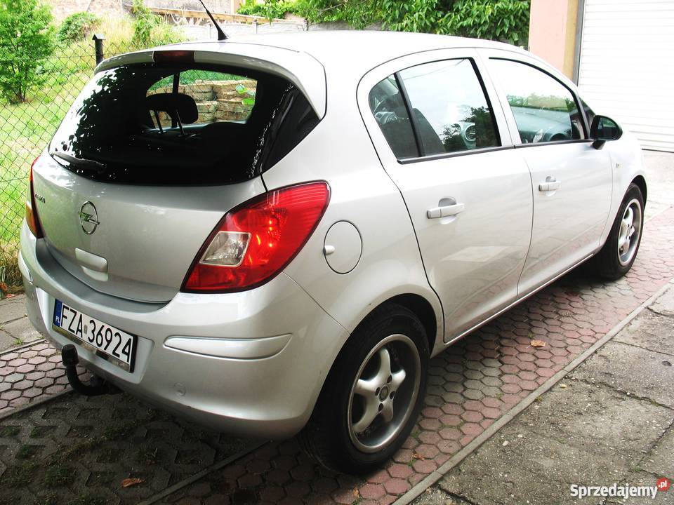 Srebrny OPEL CORSA D 12 Pb 2009 HB 5 drzwi immobilizer Żary