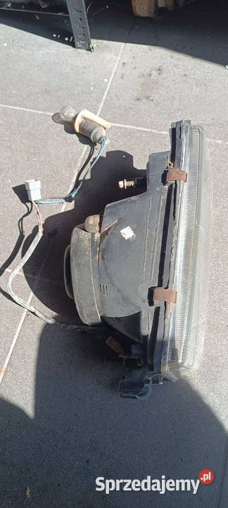 Reflektor Alfa Romeo 75 prawy osobowe Lampy przednie śląskie