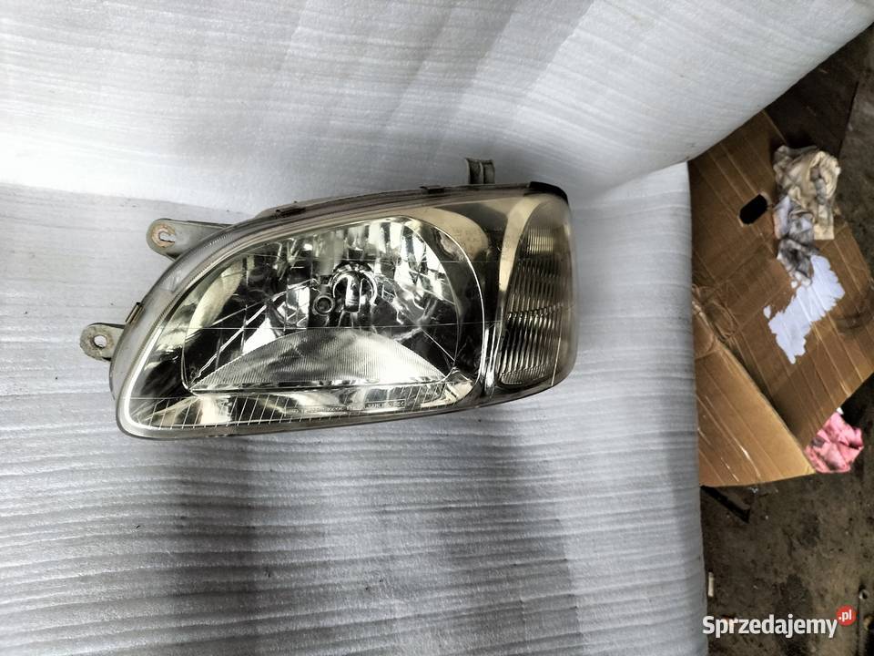 LAMPA PRZEDNIA PRZÓD LEWA KIA SEDONA CARNIVAL lampy przednie