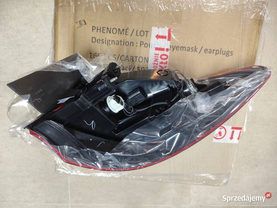 NOWA Lampa tylna lewa Opel Astra J sedan 2009 Lampy tylne Poznań