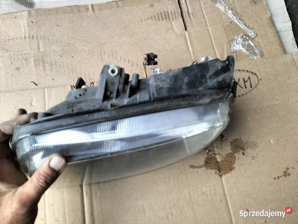 LAMPA PRZÓD PRZEDNIA LEWA REFLEKTOR VW POLO 6N Kamień-Kolonia