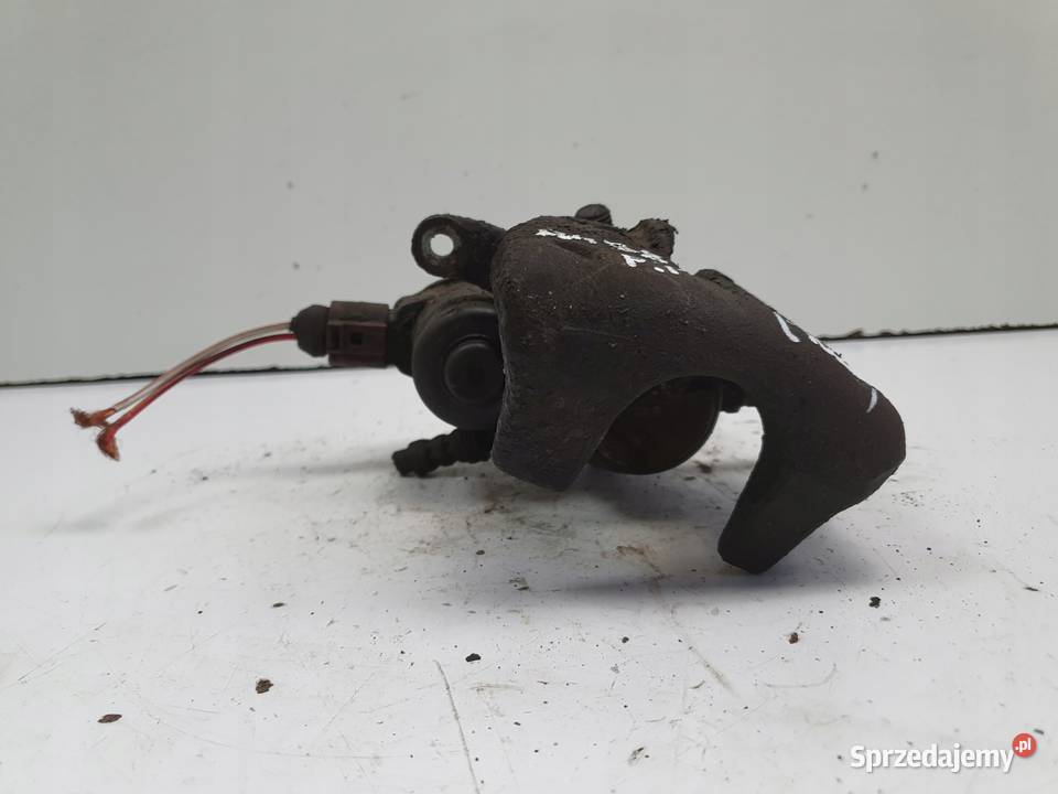 Audi A4 B8 TYLNY ZACISK HAMULCOWY prawy tył