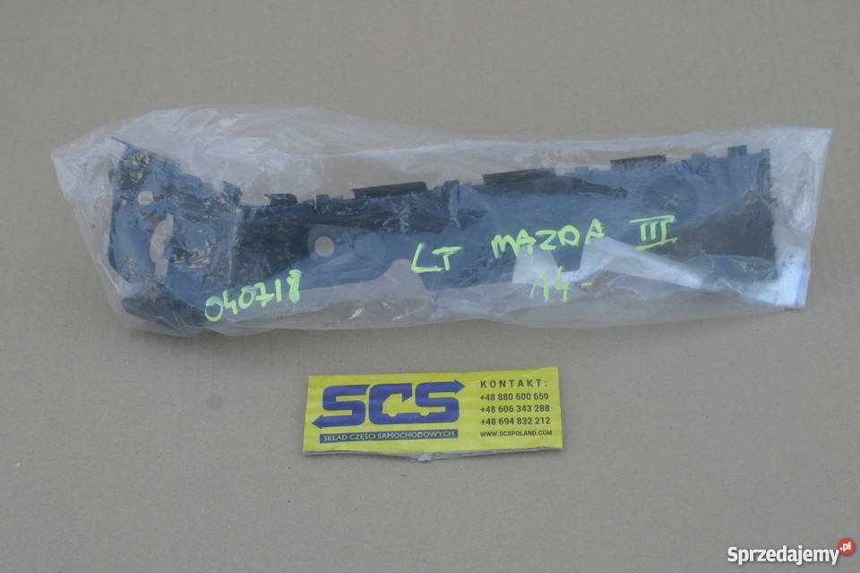 MAZDA 3 III ŚLIZG ZDERZAKA LEWY TYŁ BHN9502J1C Bieleń