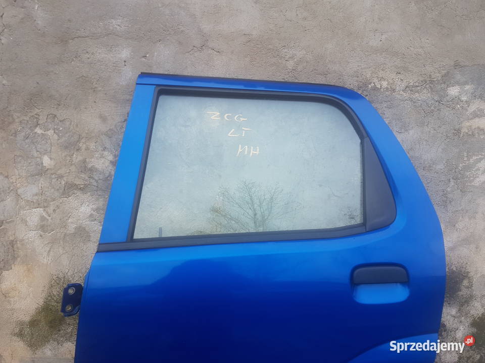 Suzuki Ignis MH Subaru G3X Justy drzwi lewe ZCG części blacharskie Legnica