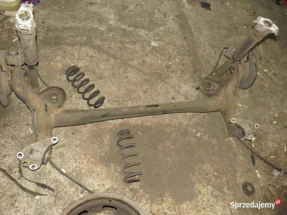 BELKA ZAWIESZENIA OŚ TYŁ HB KOMPLET OPEL ASTRA K Zestawy zawieszenia