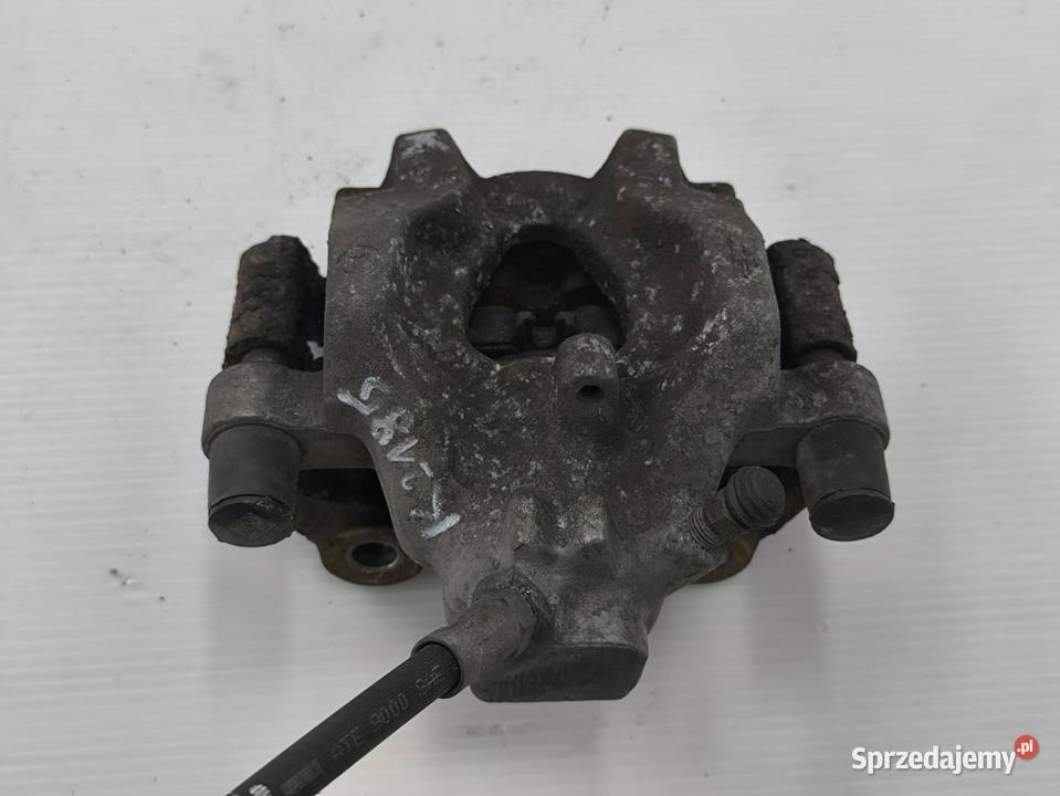 ZACISK LEWY TYŁ MERCEDES C W204 LIFT 18