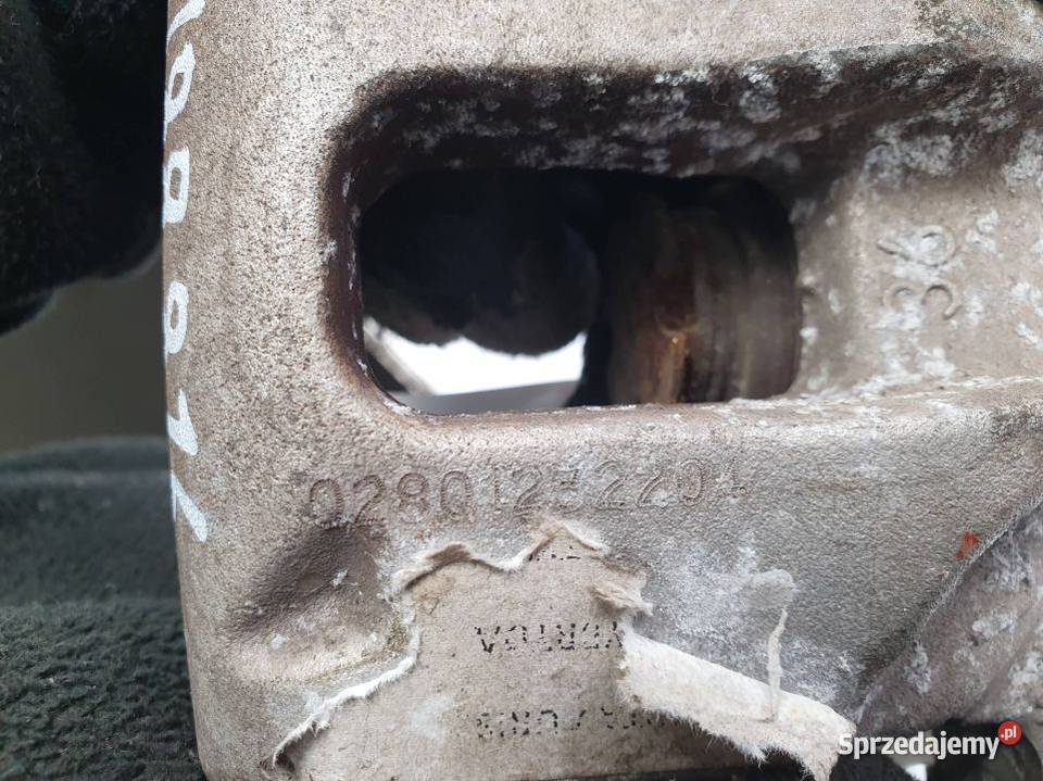 ZACISK HAMULCOWY TYŁ LEWY TOYOTA AURIS osobowe Motoryzacja Lipno sprzedam