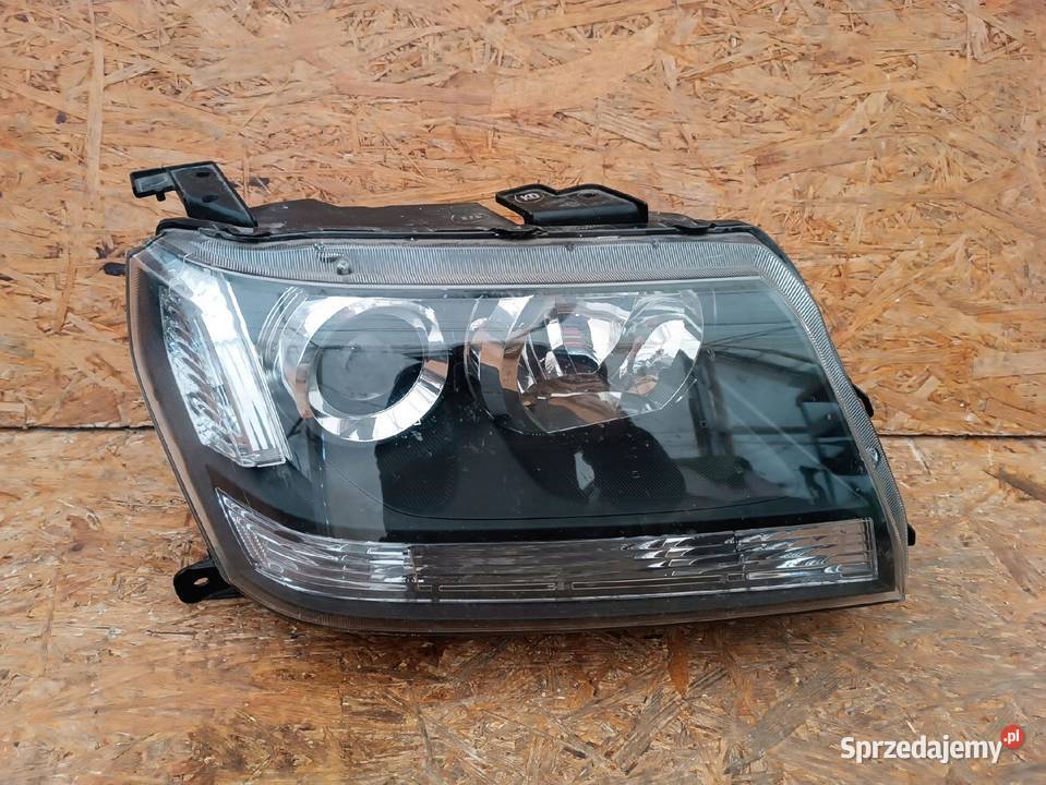 LAMPA PRAWY PRZÓD XENON SUZUKI VITARA II 0814 Oświetlenie Nowy Tomyśl sprzedam