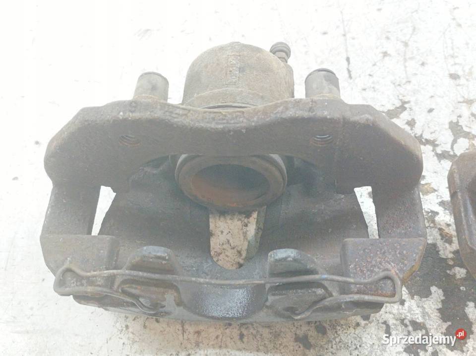 ZACISK HAMULCOWY PRAWY LEWY PRZÓD KPL 20 B Volvo osobowe Zaciski i jarzma