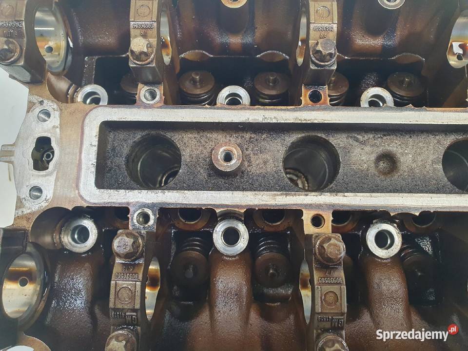Opel Corsa D 12 16V GŁOWICA CYLINDRÓW 55355430 Rudka