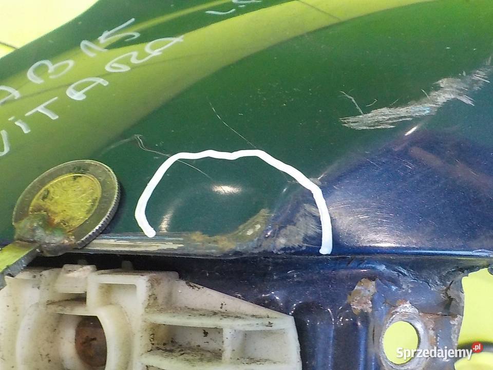 SUZUKI GRAND VITARA II 08r 5D blotnik lewy przod Suków