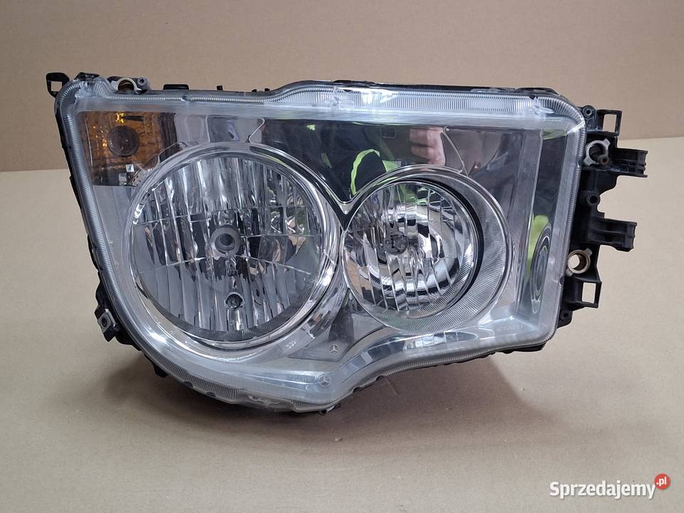 MERCEDES ANTOS AROCS REFLEKTOR PRAWY ORYGINAŁ Bieleń