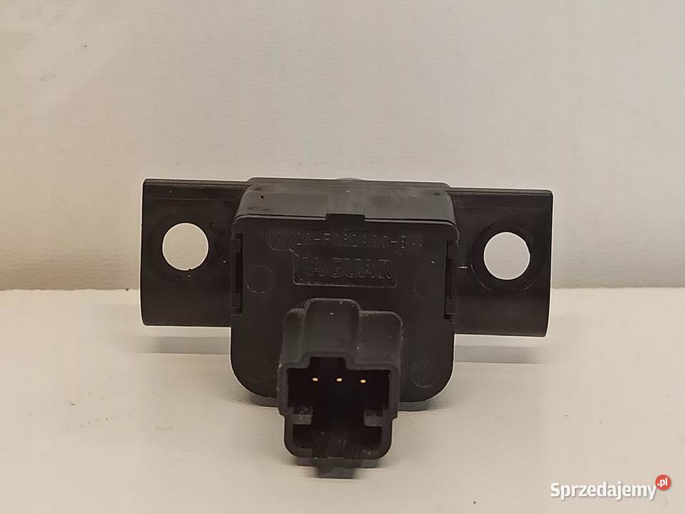 Jaguar AX23F062A00BA PRZYCISK OTWIERANIA SCHOWKA sprzedam