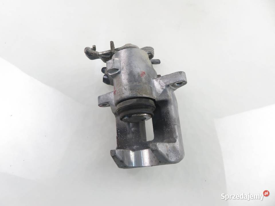 ZACISK LEWY TYŁ VW GOLF V 16 FSI sprzedam