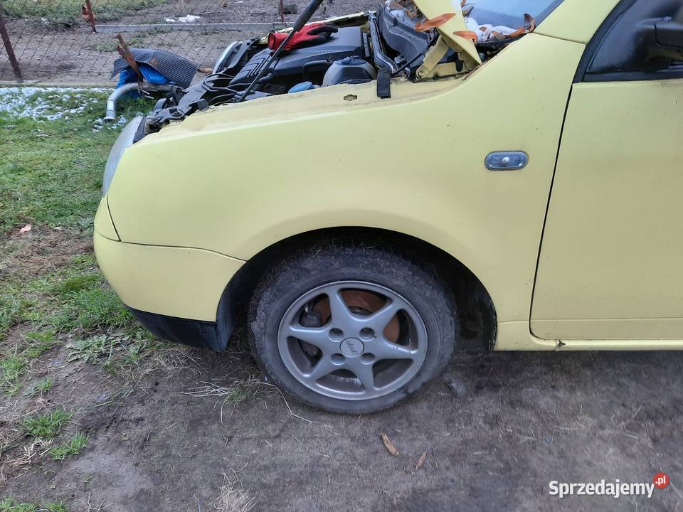 Błotnik lewy VW Lupo LD1B żółty Przyborów sprzedam