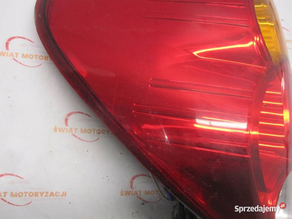 MITSUBISHI L200 07r Lampa lewy tył tylna