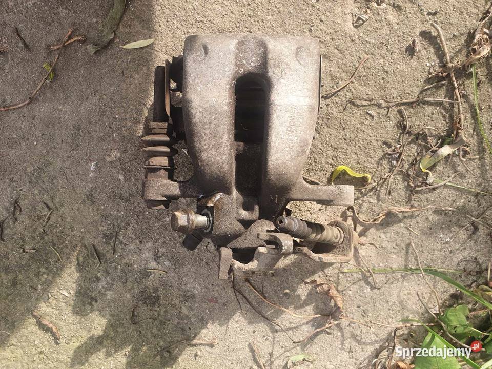 Zaciski tylny prawy Opel Astra G zafira A 9809