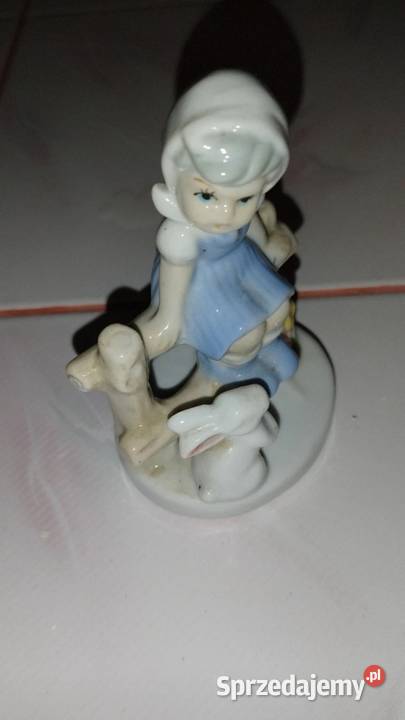 Dziewczynka na ławce z zajączkiem z porcelany łódzkie Sulmierzyce