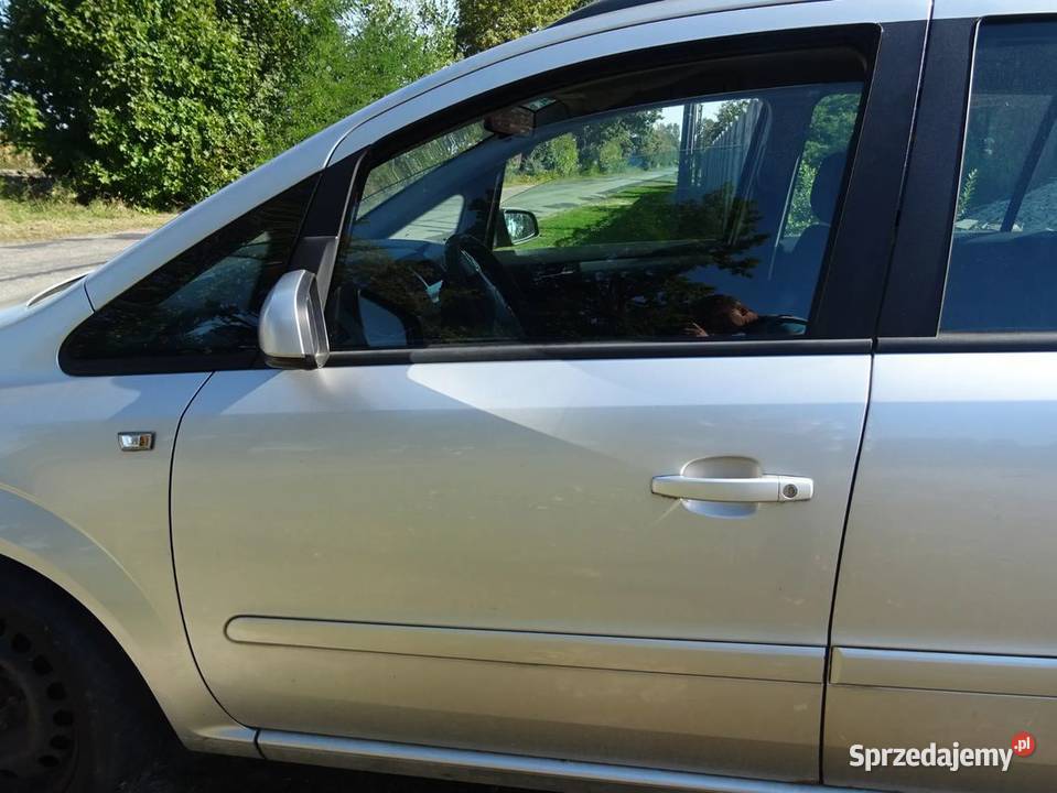 Drzwi szyba mechanizm podnośnik srebrne Zafira B osobowe Parcice