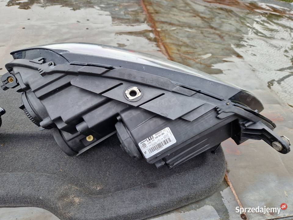 VW Passat B7 reflektor ORG KPL EU Mielec