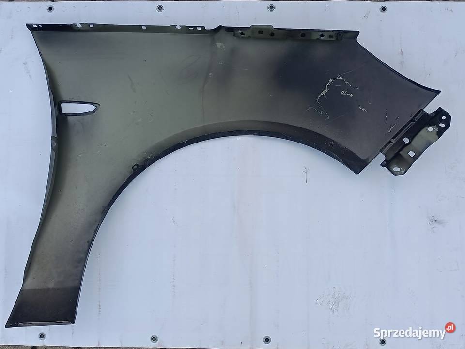 BŁOTNIK LEWY PRZEDNI OPEL ASTRA V K 15 PRZÓD MK7 Przemęt