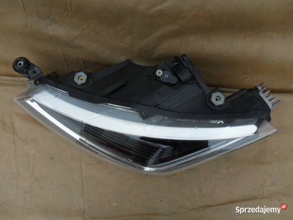 LAMPA REFLEKTOR LEWY PRZÓD EU 6F1941773A SEAT Nowy Tomyśl sprzedam