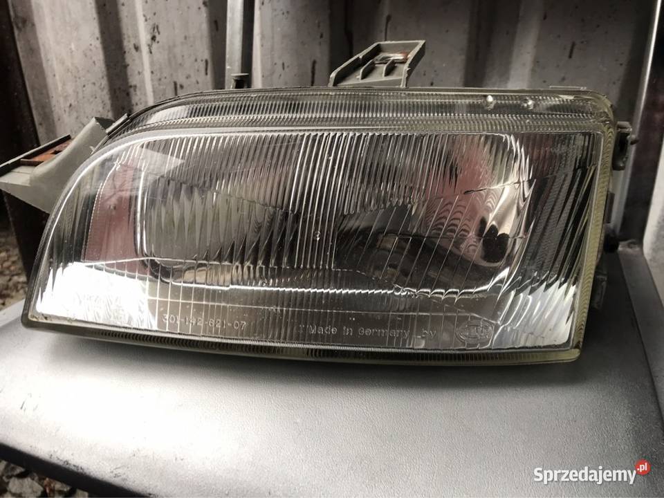 Reflektor lewy przód Fiat Punto 30114262107 osobowe Lampy przednie Rzeszów sprzedam