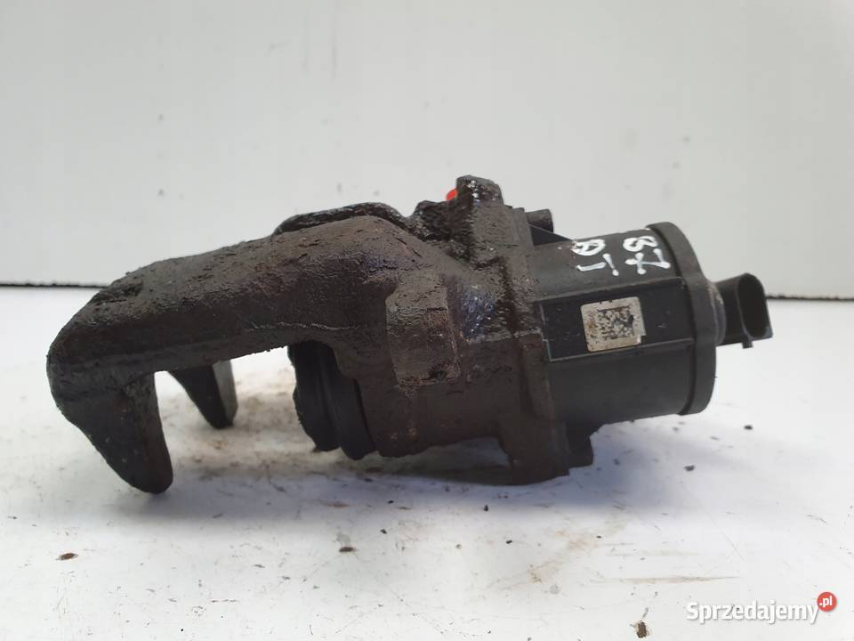 VW Passat B7 TYLNY ZACISK HAMULCOWY prawy tył Chełm