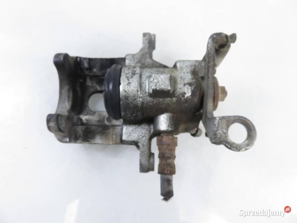 ZACISK LEWY TYŁ FORD FOCUS MK1 I 18 TDDi