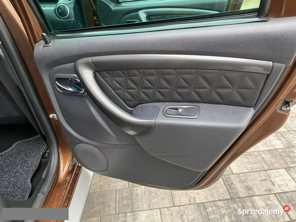 Dacia Duster BEZWYPADKOWE Niski oryginalny aluminiowe felgi Poznań sprzedam