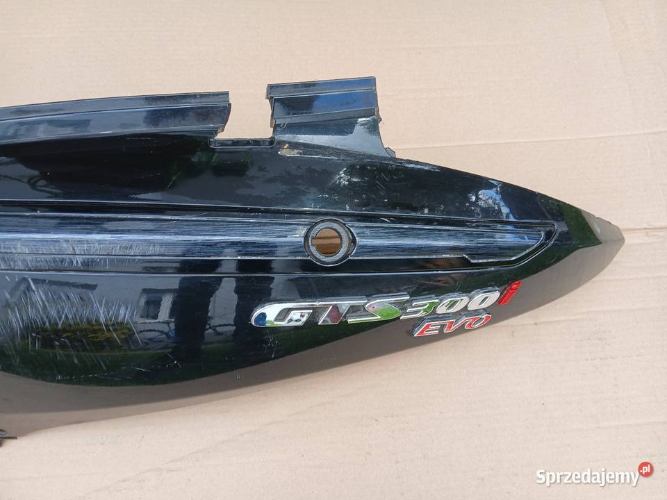 Zadupek lewy Emblematy Sym Gts 300i Pozostałe