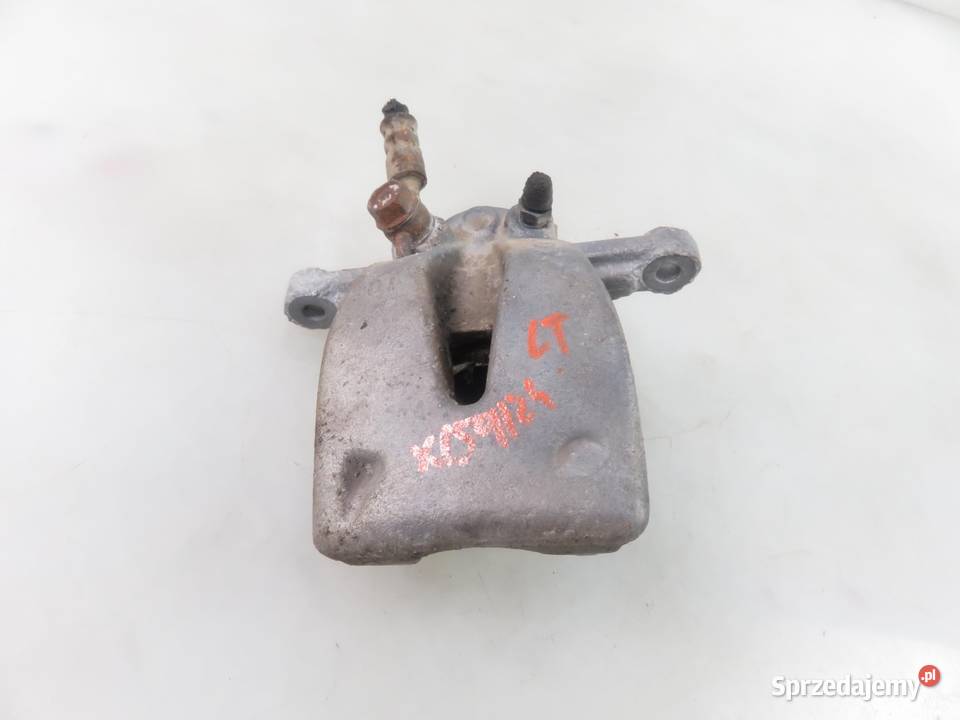 ZACISK LEWY TYŁ TOYOTA AVENSIS II T25 małopolskie