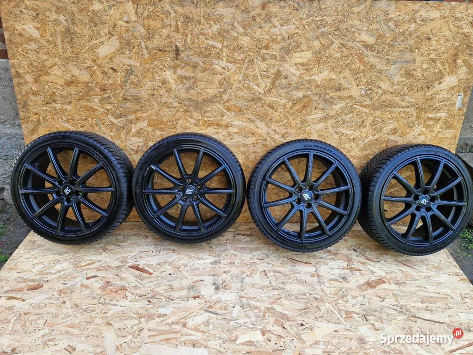 VW FELGI ALUMINIOWE ET39 571mm 5x100 7Jx18 OPONY Słowikowo