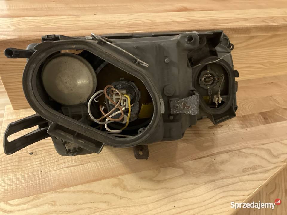 Mercedes SE W126 Lampa przednia lewa reflektor Łochów
