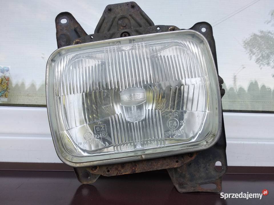 Nissan Navara D21 King Cab lampa przednia lewa Sieradz
