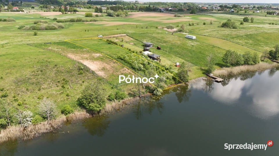 Siedliska działka z linią brzegową jeziora polna