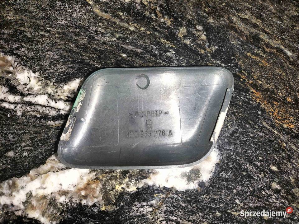 Zaślepka spryskiwacza reflektora