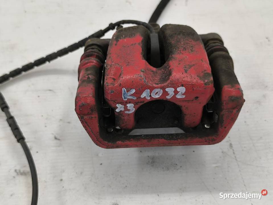 ZACISK HAMULCOWY LEWY TYŁ BMW E90 20i Motoryzacja